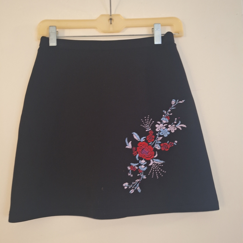 Express Black Skirt with Red and Blue Floral Design